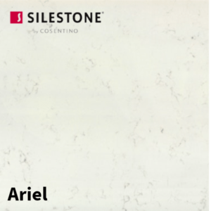 A high-gloss white Silestone Quartz worktop reflecting pendant lighting
