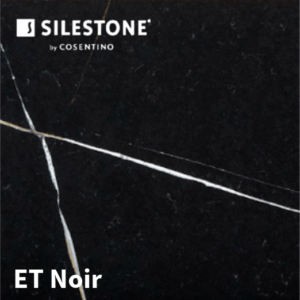 A dark grey granite worktop with subtle flecks, adding depth to a kitchen.