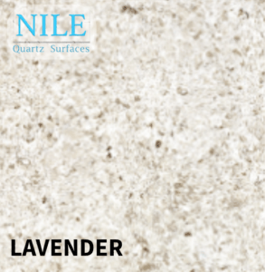A dark grey quartz worktop with a matte finish in a sleek kitchen.