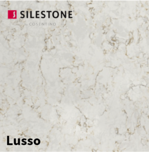 A modern kitchen with a dark quartz island and high-gloss finish.Worktops for London Homes, Custom Quartz Kitchen Worktops Tailored for London, London’s Trusted Supplier for Quartz Kitchen Worktops, High-Quality Quartz Countertops for Homes in London