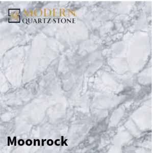 A luxury kitchen featuring quartz countertops and integrated appliances.