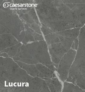 A marble waterfall edge worktop from Serene Stones, creating a seamless kitchen design.