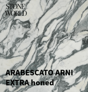 A deep black Stone worktop with a polished surface, reflecting ambient lighting.