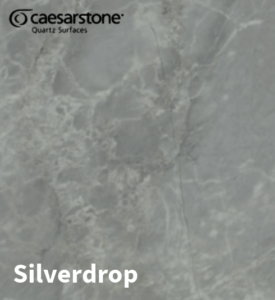 A bespoke waterfall edge quartz worktop by Serene Stones for contemporary kitchens.